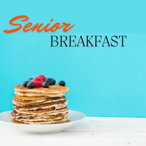 Pancakes with fruit on a blue background. 