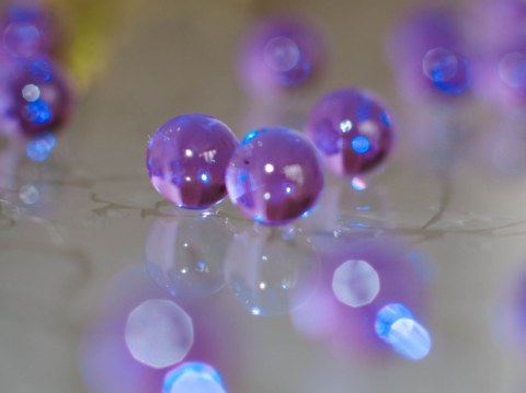 Purple orbeez on a mirror