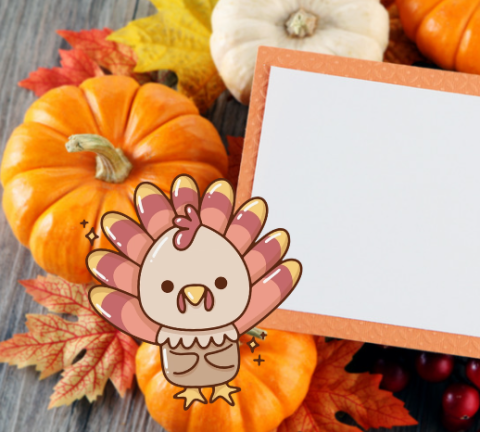 cartoon turkey, pumpkins, and leaves on a wooden table