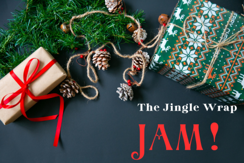 The Jingle Wrap Jam! Christmas presents on a black table.