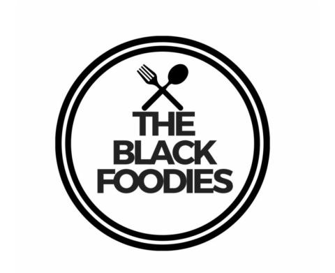 The Black Foodies logo. "The Black Foodies" writen inside 2 circles with a spoon and a fork crossed on the top.