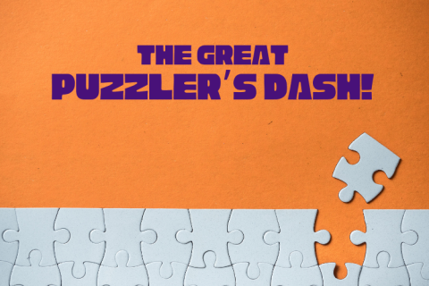 White puzzle pieces on a orange table. Title, "The great Puzzler's Dash".