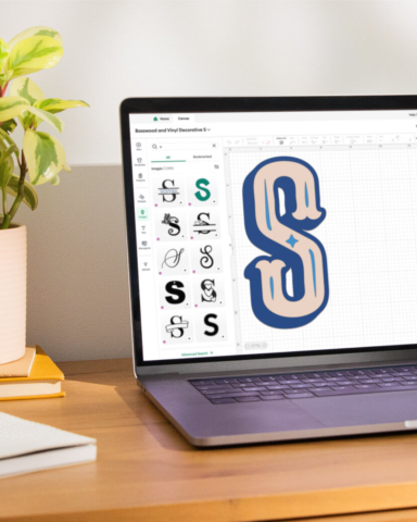 Laptop with Cricut Design Space open creating a monogram design