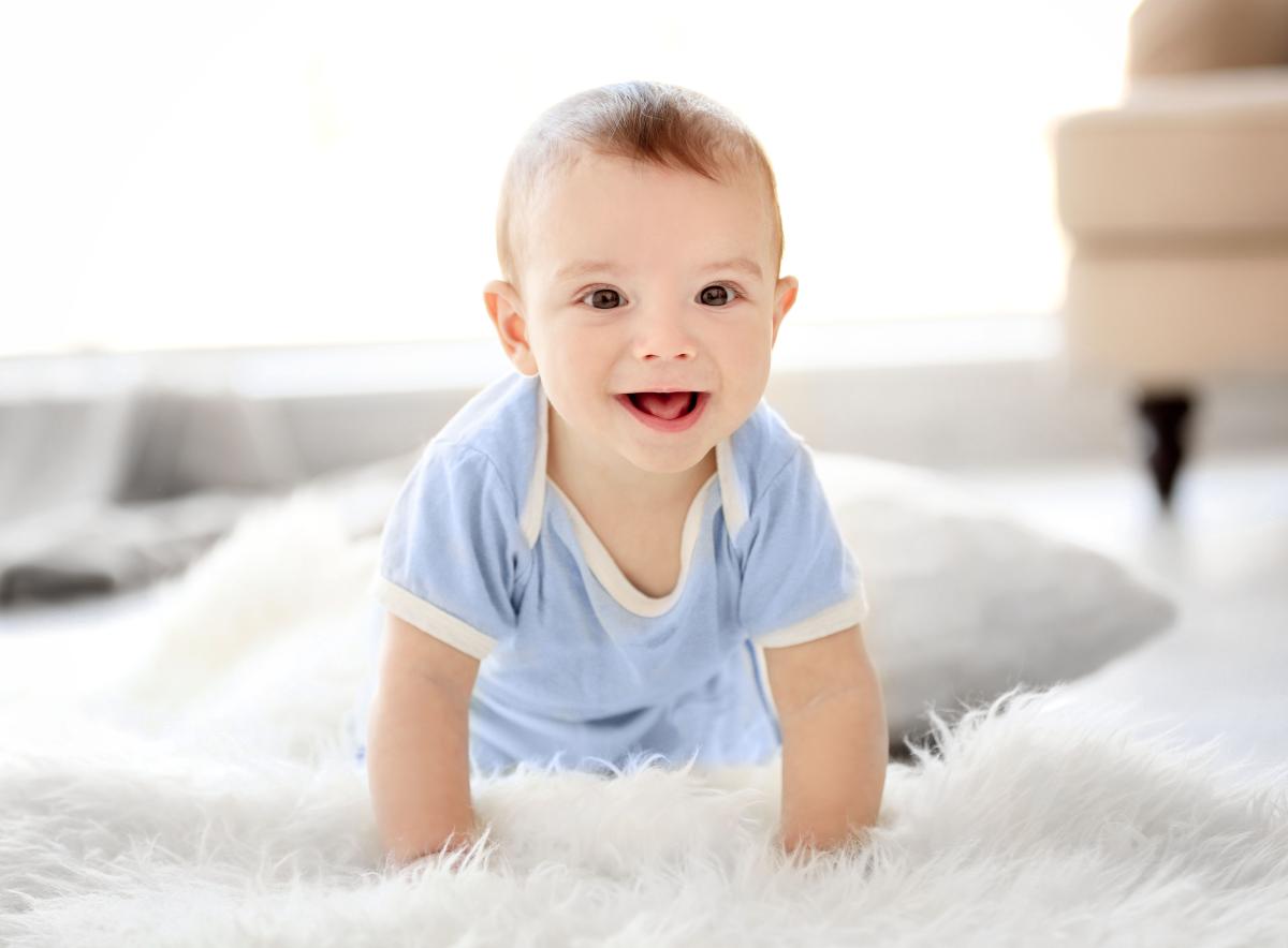 baby age 0-12month crawling on floor