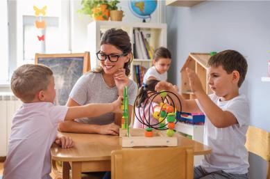 daycare teacher with students