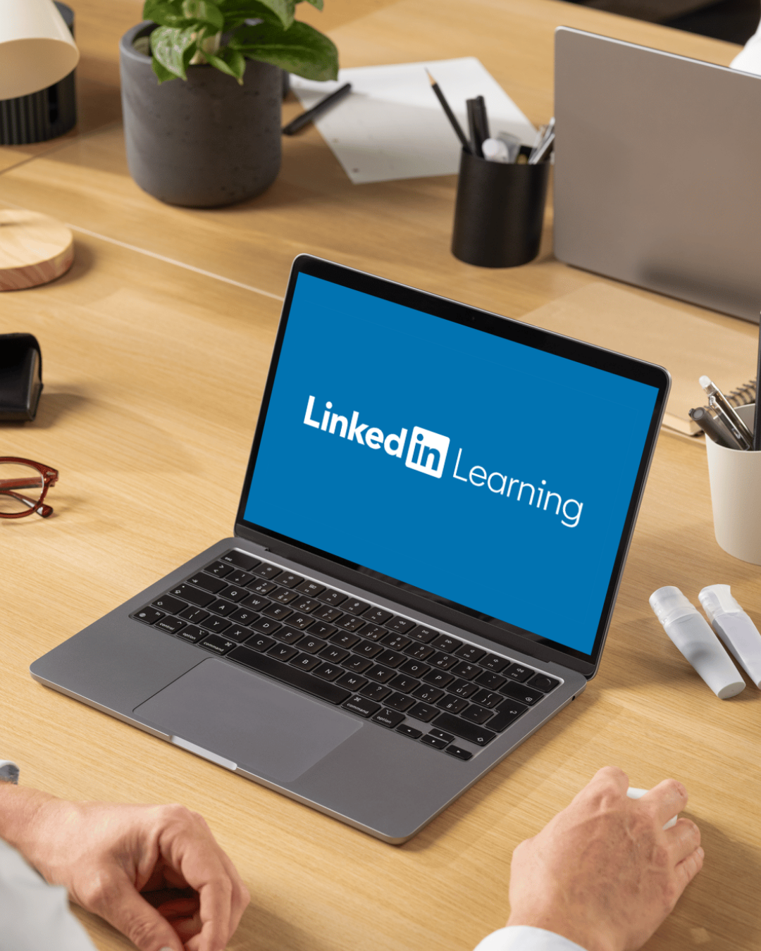 Person on laptop with LinkedIn Learning onscreen